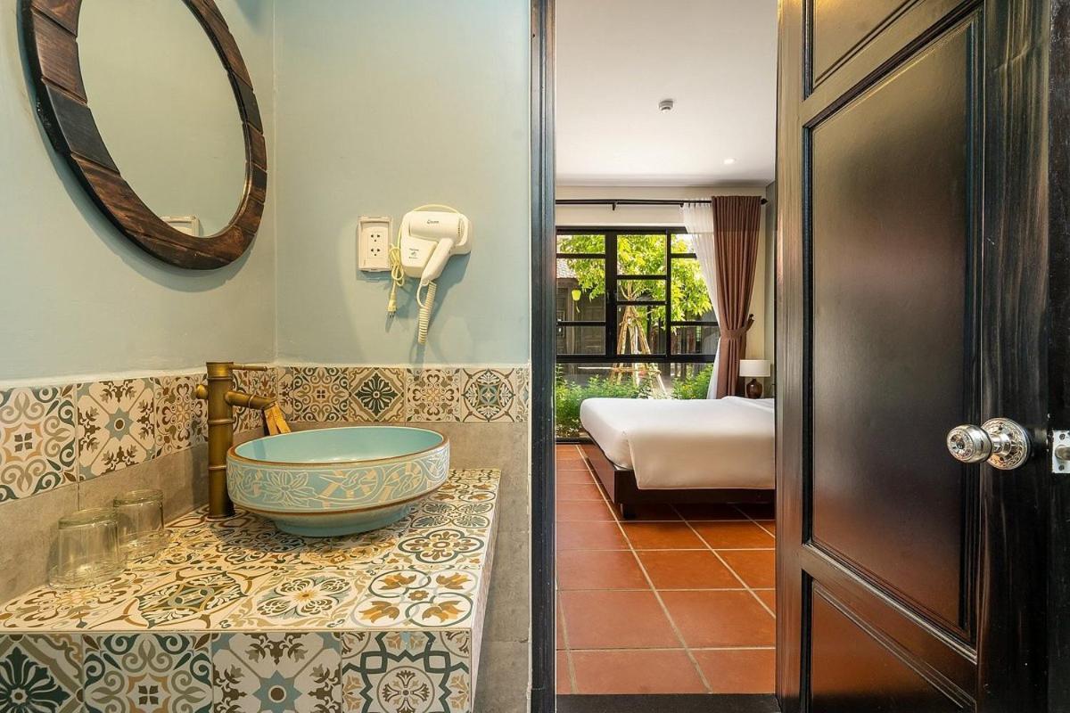 Nature Villa Hoi An By K D H An Bàn Extérieur photo